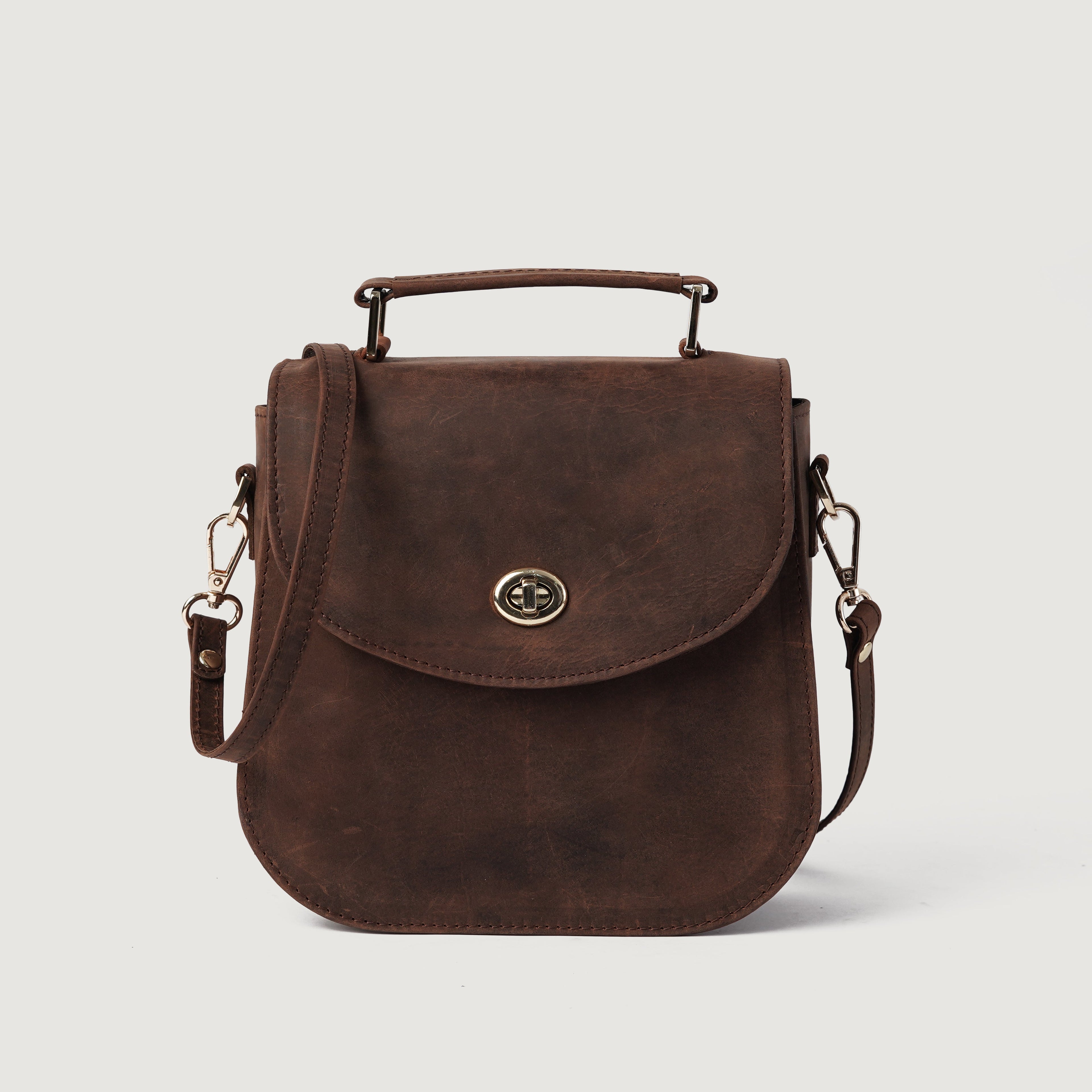 Sandra Vintage Leather Saddle Bag for Women | Distressed Brown Cowhide with Twist Lock and Detachable Strap 0